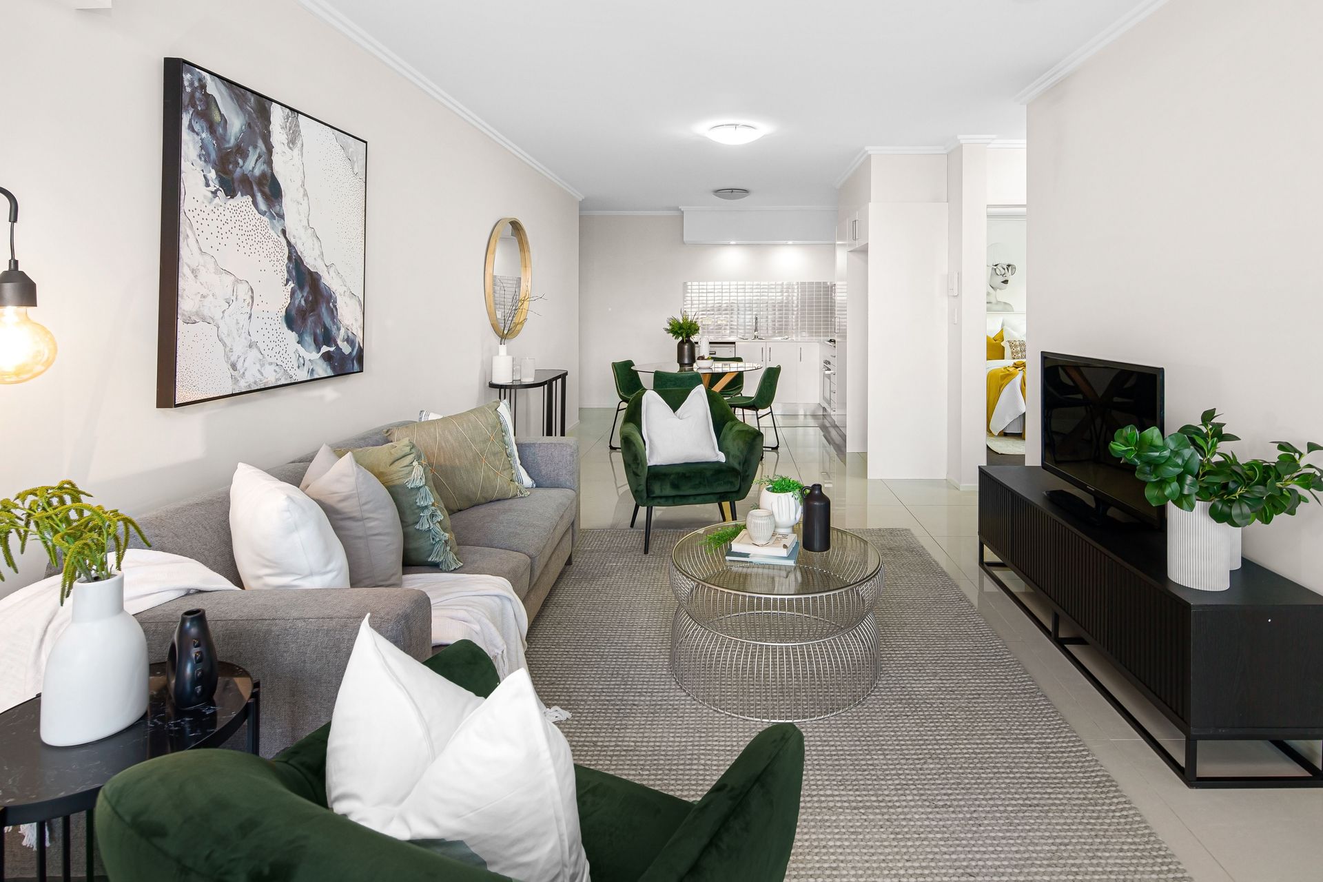 Spacious and stylish living room interior featuring contemporary furniture and decor.